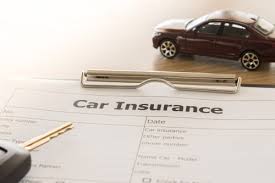 Image Shows Car Insurance Paperwork With Key And Car