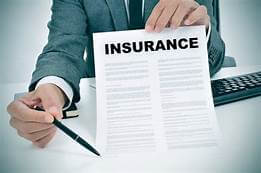Image Shows An Agent Explaining An Insurance Policy Document